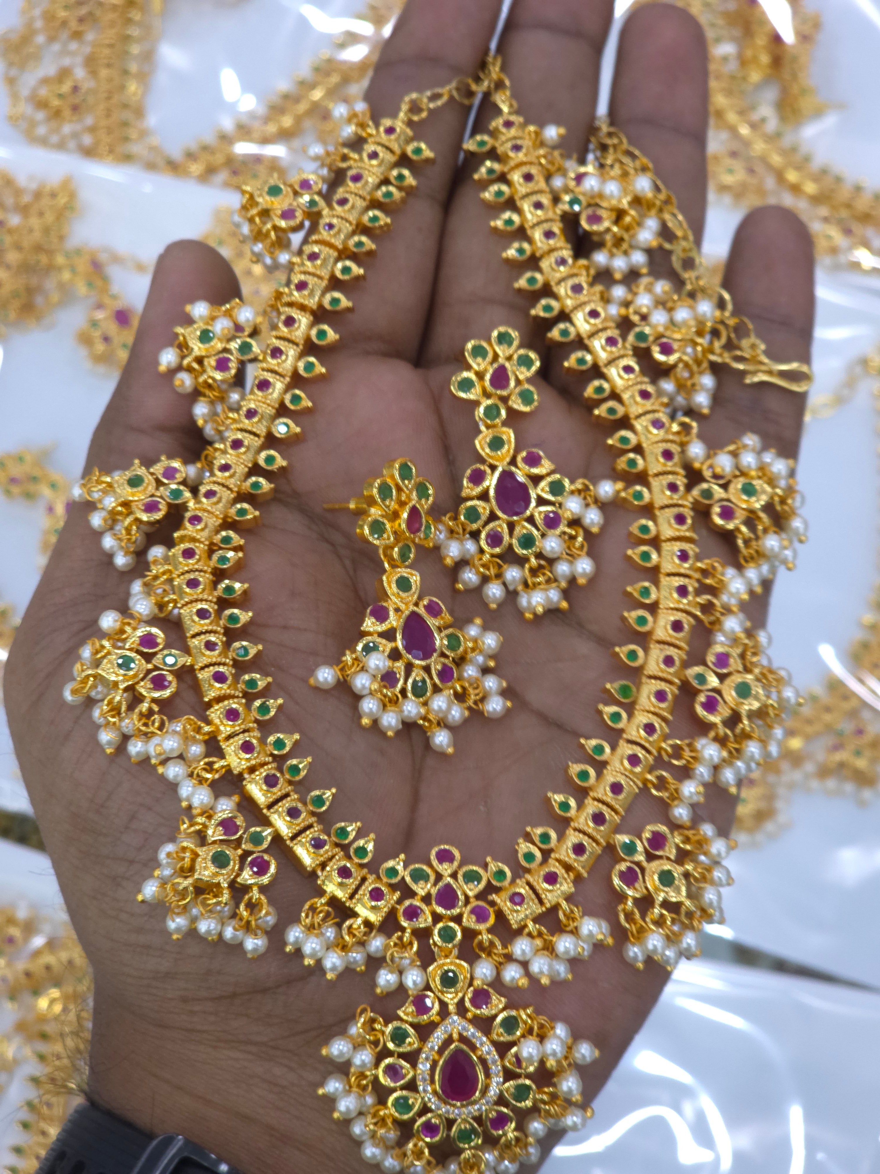 Gold finish Guttapusallu necklace
