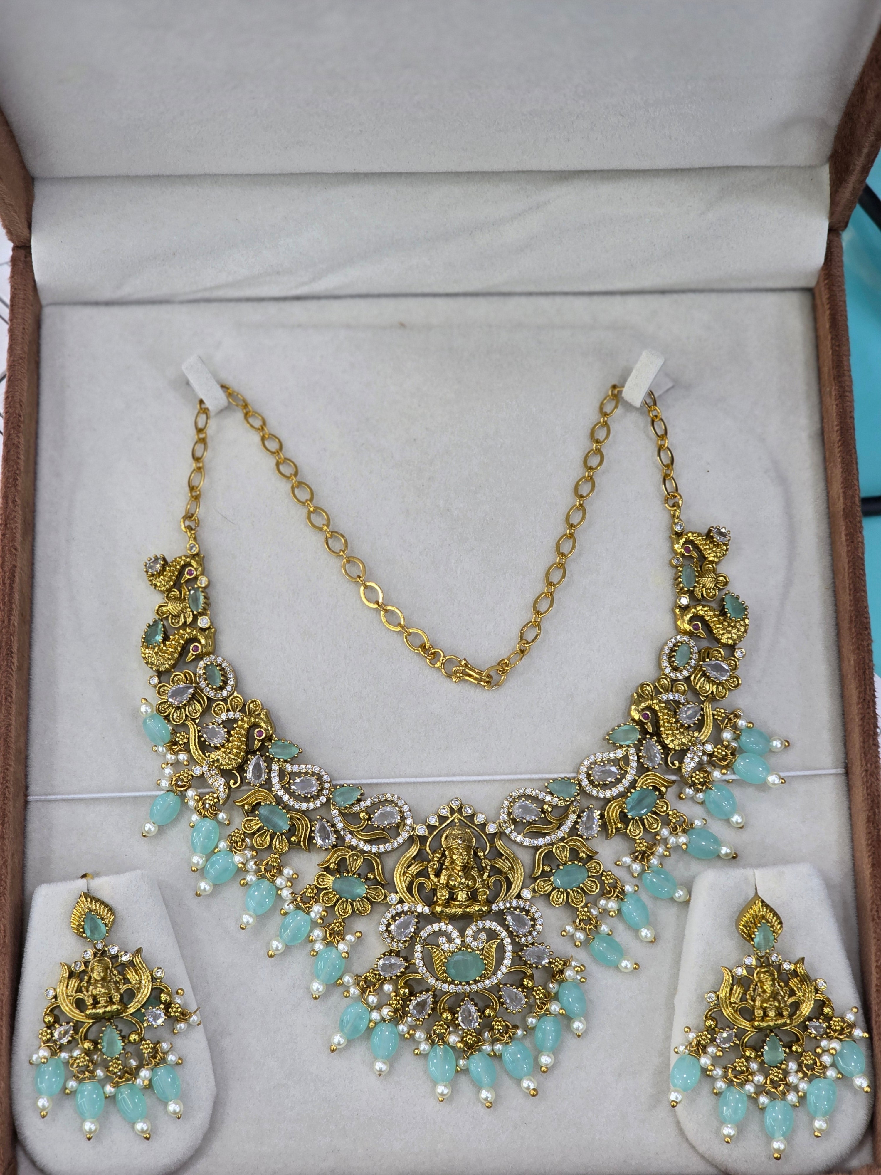 Matt finish cz Lakshmi necklaces.