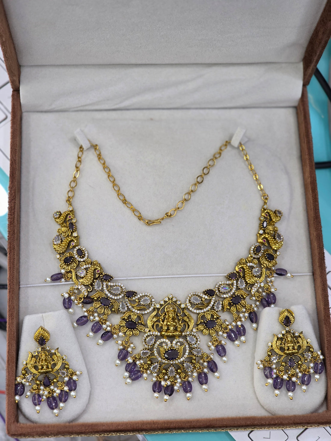 Matt finish cz Lakshmi necklaces.