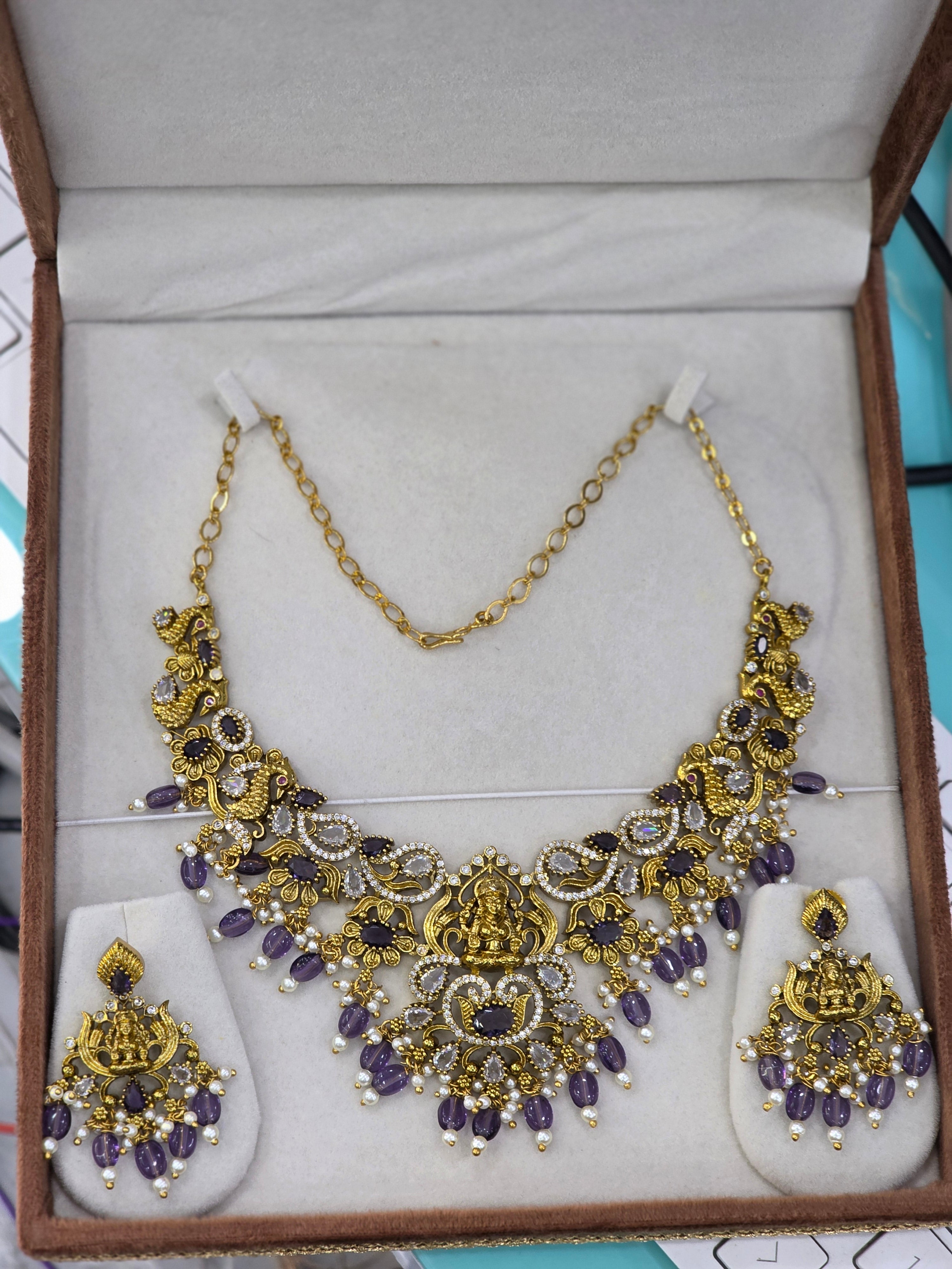 Matt finish cz Lakshmi necklaces.