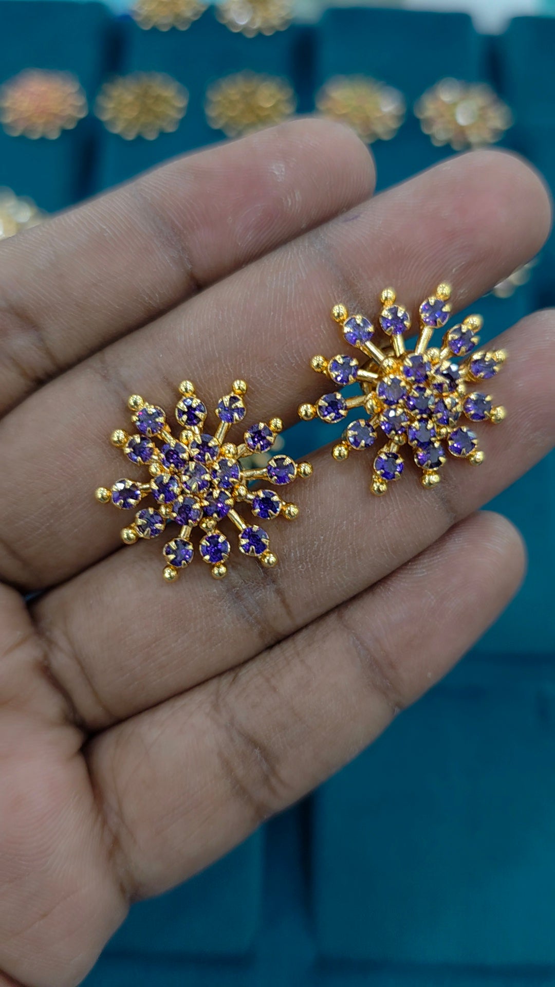 Gold finish debatable earrings