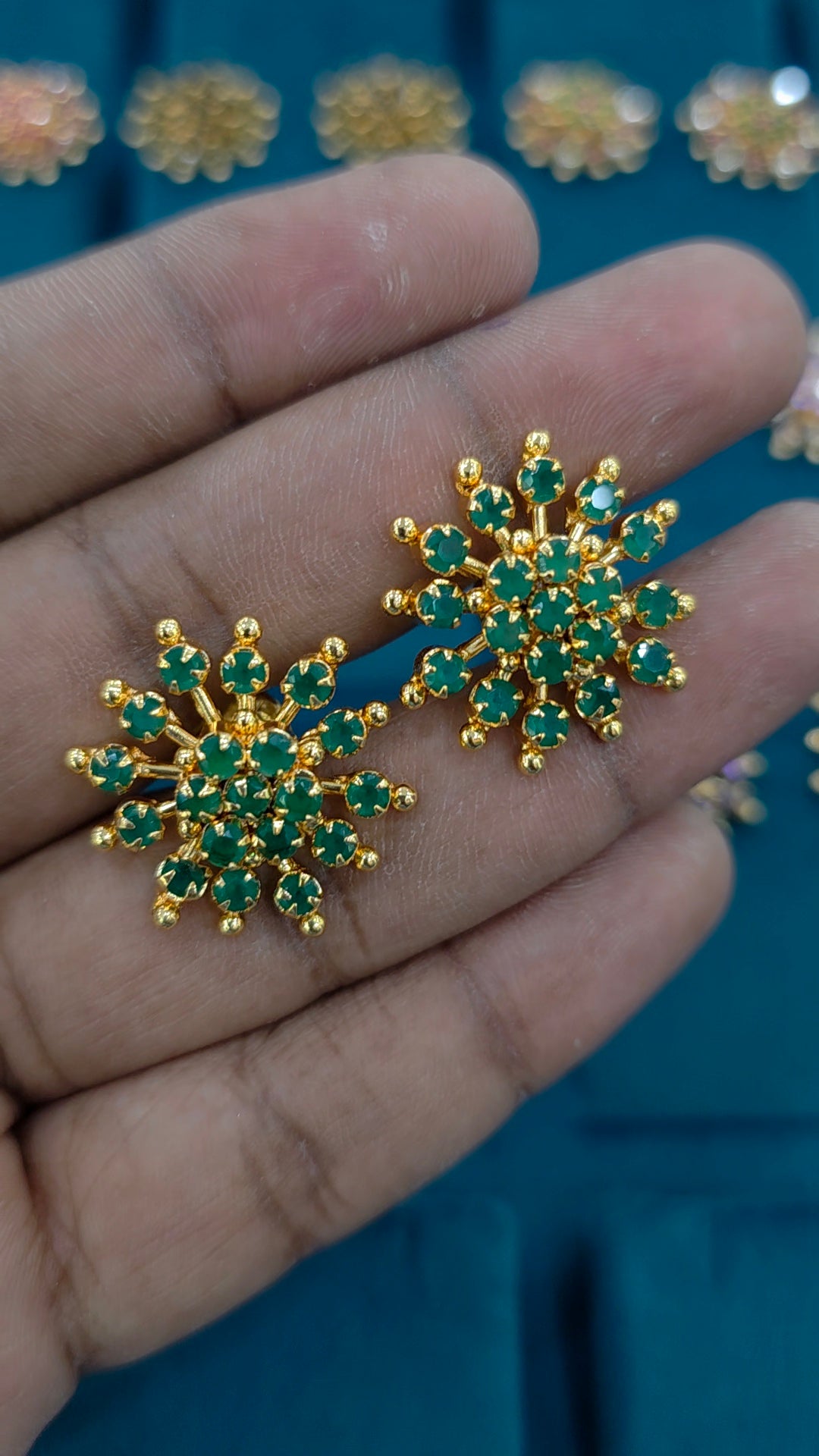 Gold finish debatable earrings