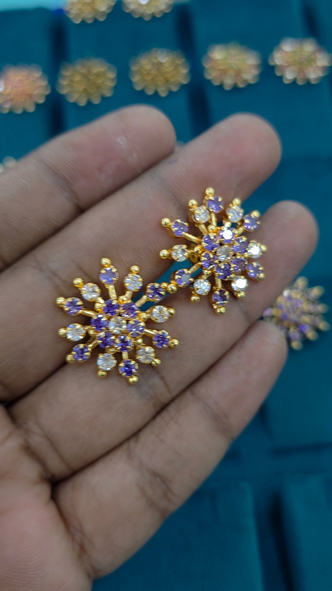 Gold finish debatable earrings