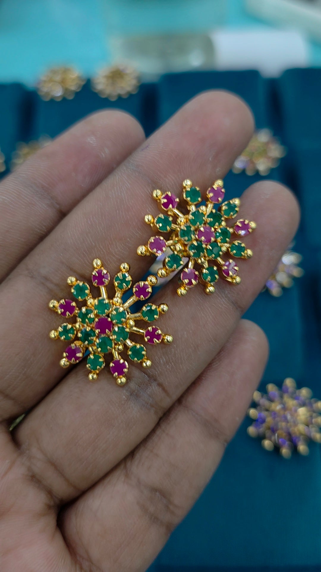 Gold finish debatable earrings