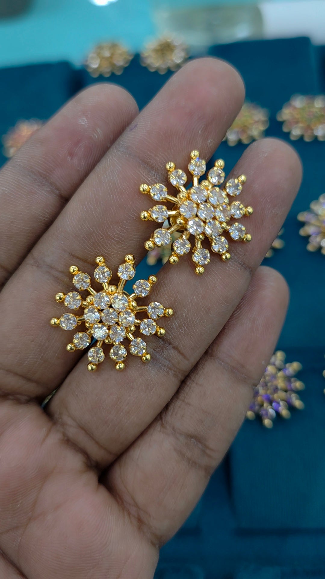 Gold finish debatable earrings
