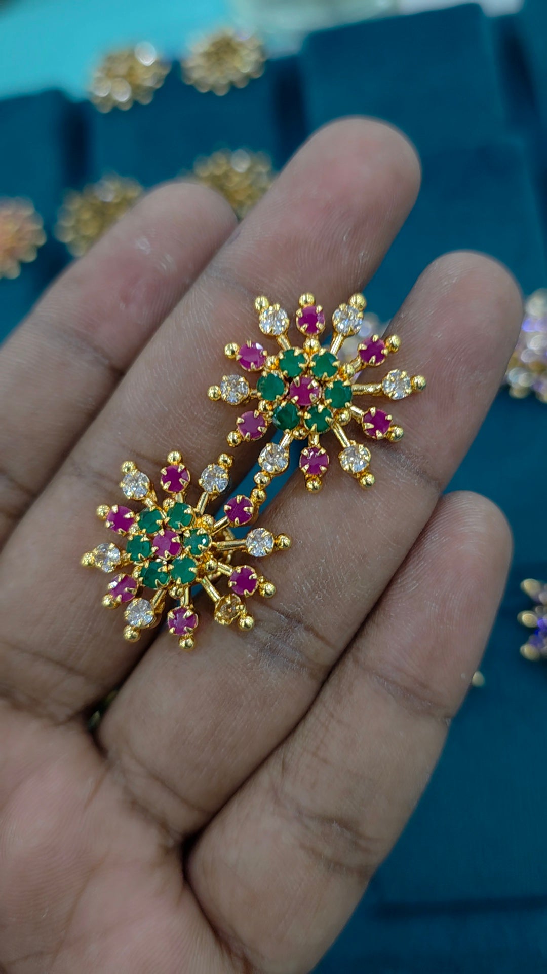 Gold finish debatable earrings