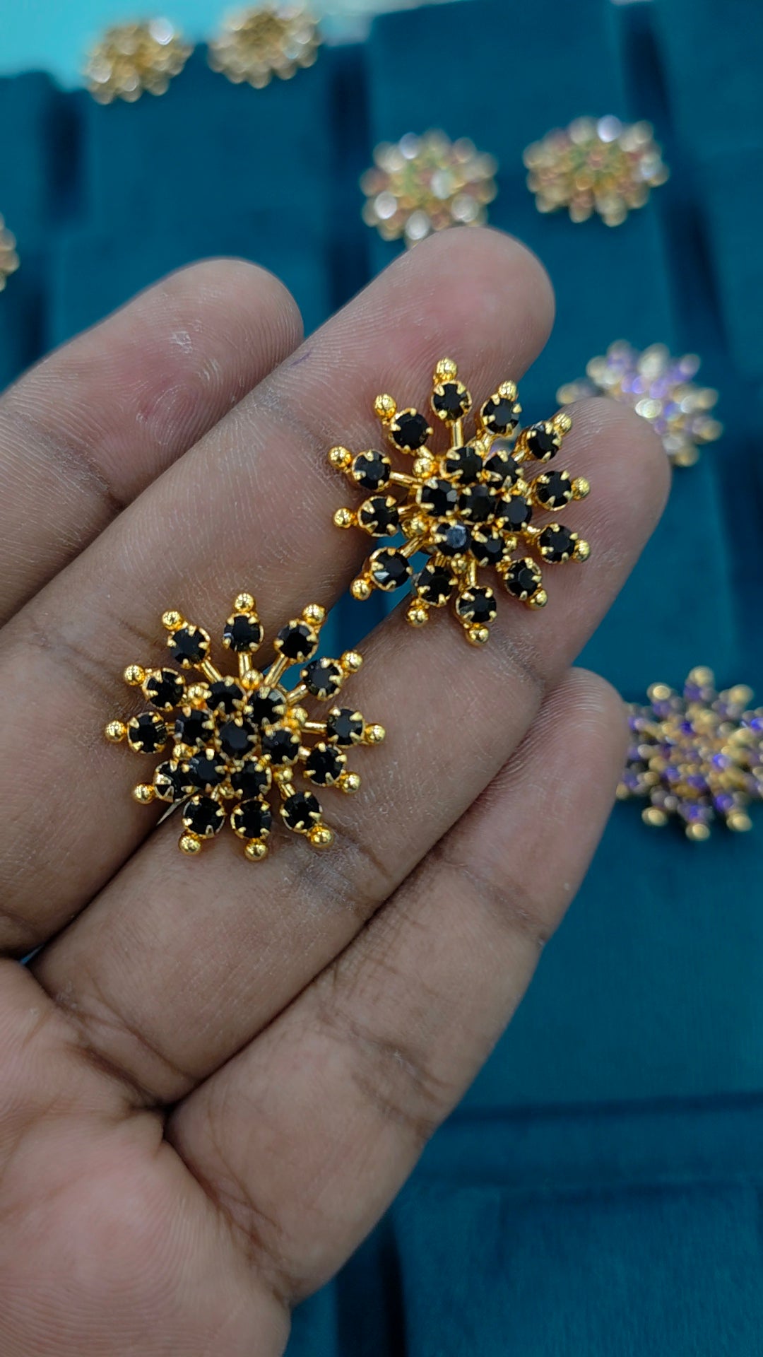 Gold finish debatable earrings