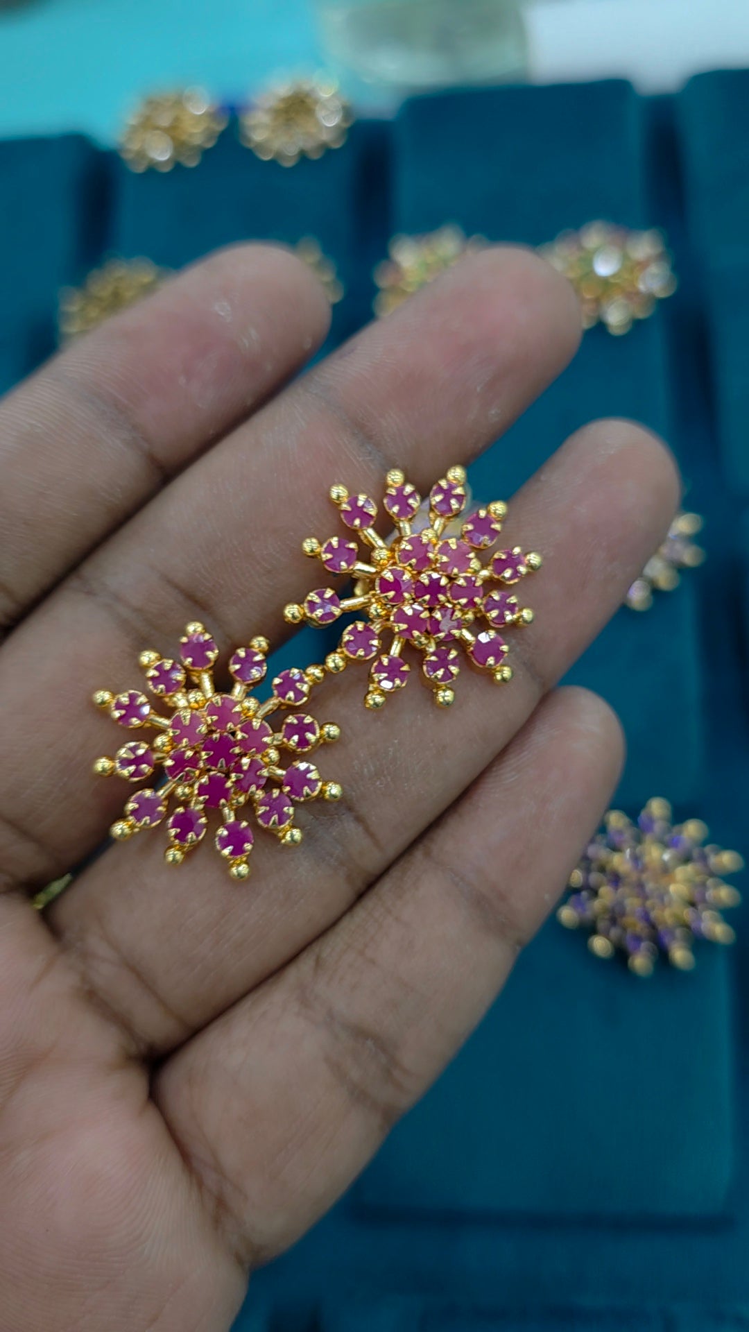 Gold finish debatable earrings