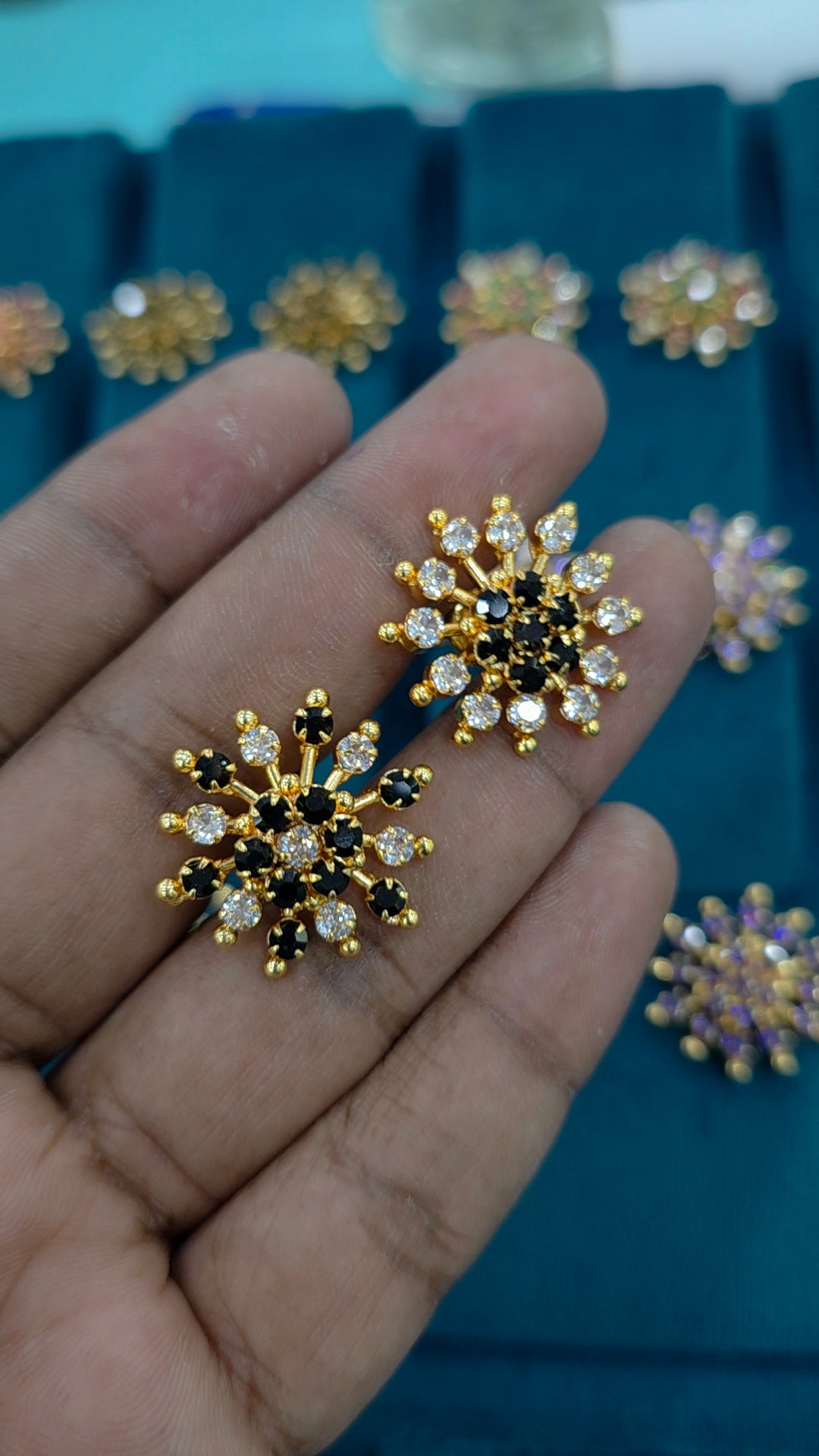 Gold finish debatable earrings