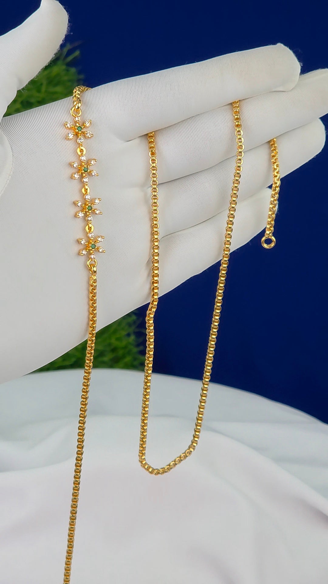26 in gold finish Thalli chains