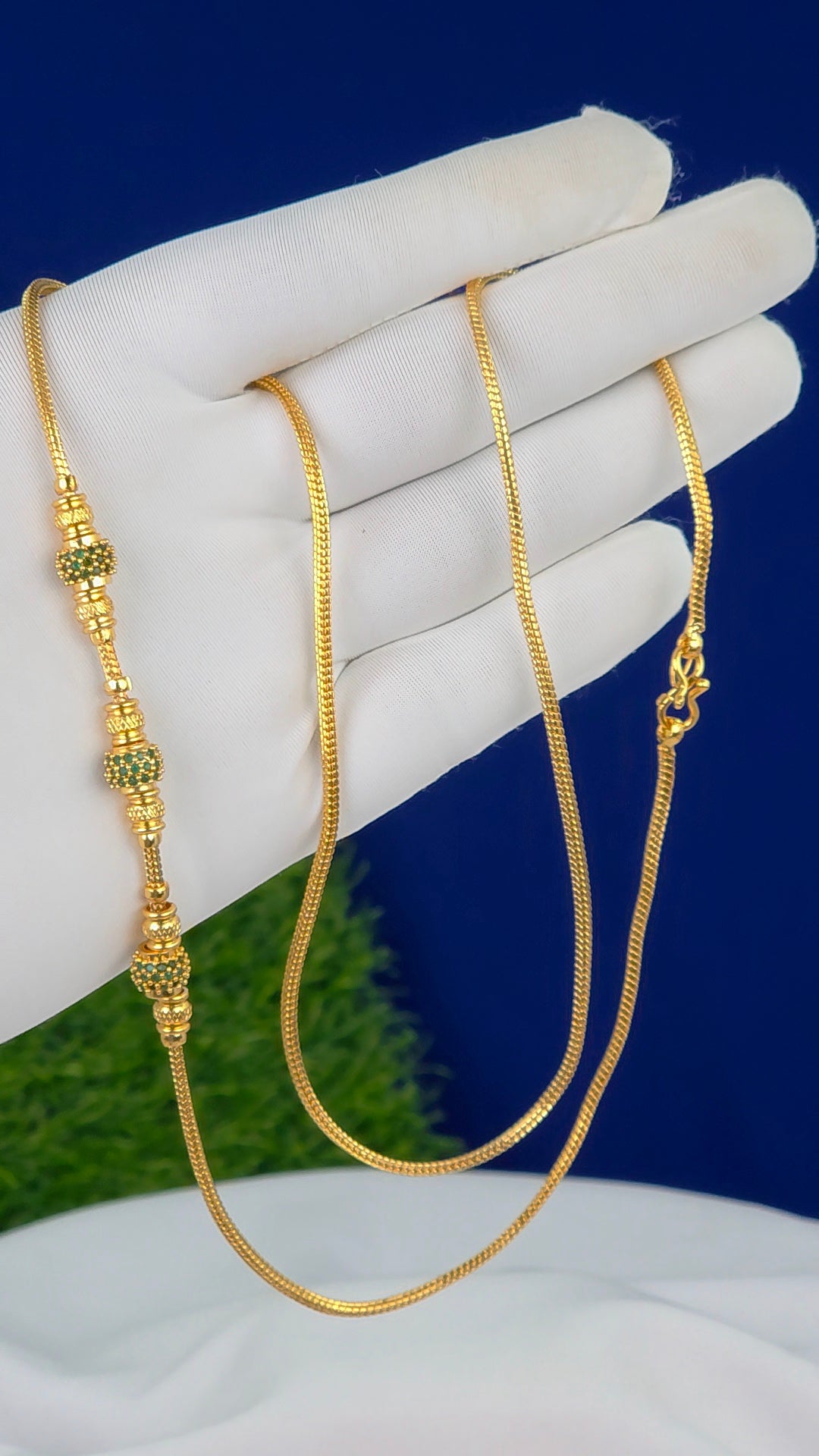 26 in gold finish Thalli chains