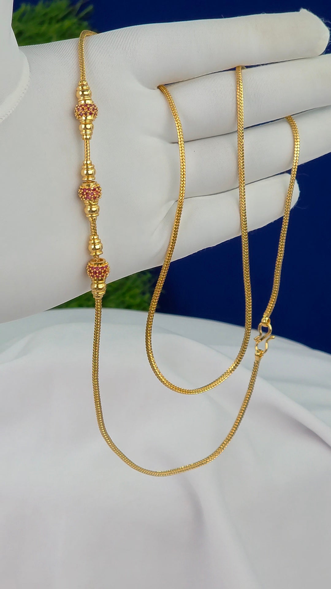 26 in gold finish Thalli chains