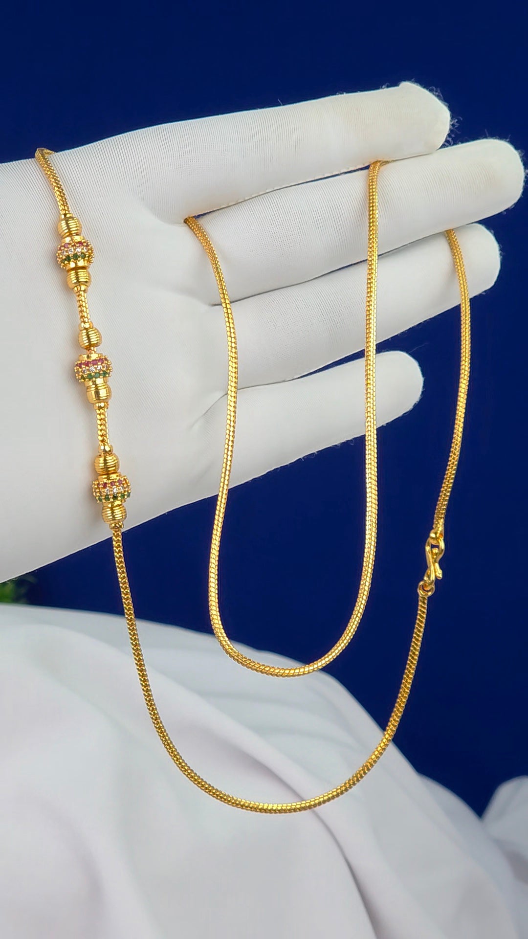 26 in gold finish Thalli chains