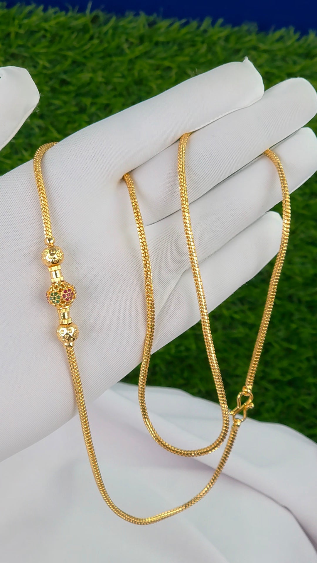 26 in gold finish Thalli chains